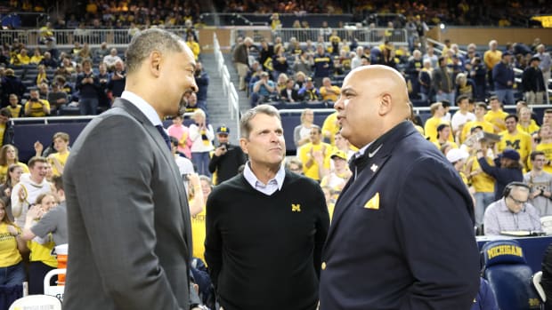 Juwan howard jim harbaugh warde manuel